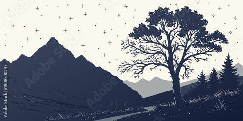 A lone tree stands tall against the backdrop of a majestic mountain range.