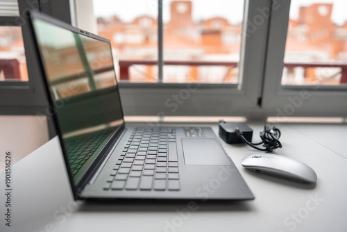 Wallpaper Mural Office technology equipment to work remotely from home, laptop and mouse. Torontodigital.ca