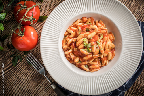 Cavatelli pasta with fresh tomato sauce.