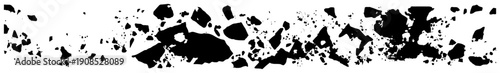 Abstract scattered black debris and stone fragments