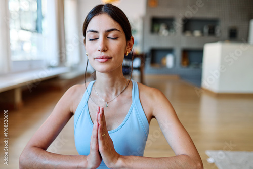 Portrait of a fit black girl young woman exercising practicing yoga or fitness at home Free Download Portrait of a fit black girl young woman exercising practicing yoga or fitness at home - GFXLoad