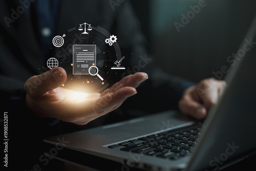 Business compliance and legal documentation concept with glowing digital document icon above laptop, representing governance, policy review, audit process, risk management and regulatory control.