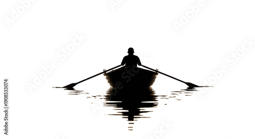 A stark silhouette of a lone rower in a small boat perfectly mirrored on calm dark water high quality