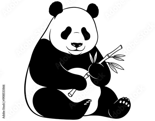 A black and white panda enjoying a peaceful moment with bamboo leaves