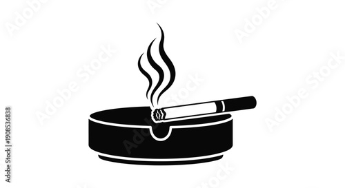 A black ashtray with a lit cigarette displayed as a silhouette