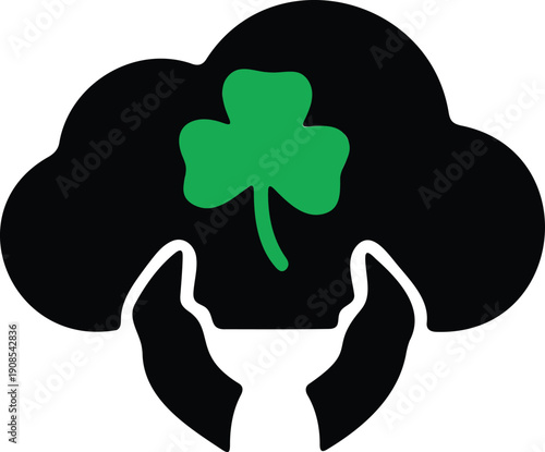 Hand holding a green fourleaf clover with a large black cloud  symbol of good luck and nature