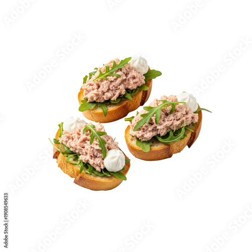 Three tuna bruschetta with arugula and cream
