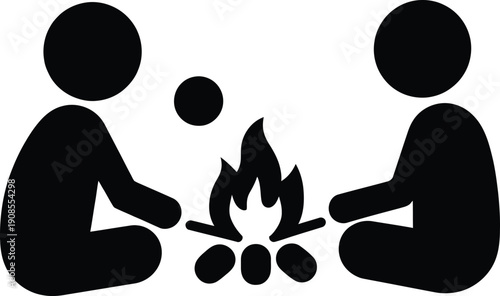 Two people sitting together by a campfire, enjoying a peaceful evening outdoors.