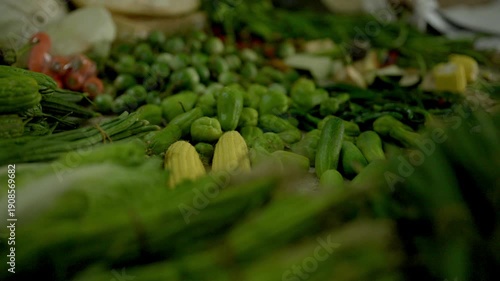 Vibrant Display of Assorted Fresh Thai Vegetables at a Traditional Street Market