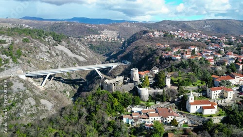 Combining history and modernity: Trsat Castle overlooks the Rjecina Valley, with the impressive Rjecina Viaduct spanning the gorge. A stunning aerial view of Rijeka, Croatia.