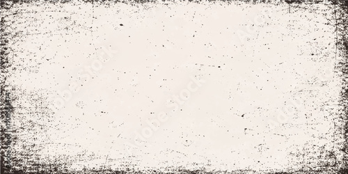 Aged vintage black and white grunge background featuring a rough textured stone wall surface with a dirty antique paper pattern