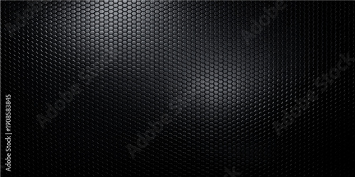 A seamless dark carbon fiber and black metallic mesh texture featuring an industrial grid pattern on a brushed steel surface for a modern technology wallpaper design