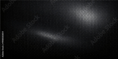 Dark industrial wallpaper featuring an abstract black carbon fiber texture with a metallic hexagonal grid pattern on a brushed steel surface