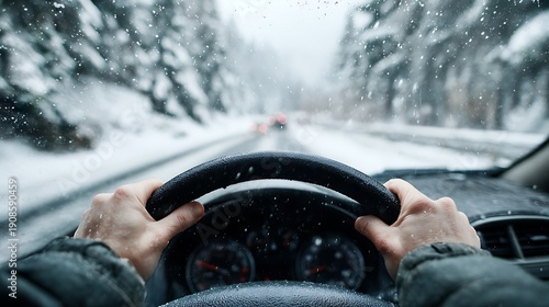 First person view of driving a car on a snow covered road during a winter blizzard through a pine forest