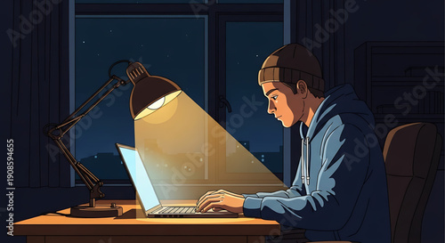 Man sitting at desk working on laptop under desk lamp at night in dark room with window