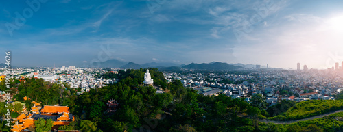 Photos Nha Trang , Vietnam - April 5, 2025: big white Buddha statue overlooking citysca