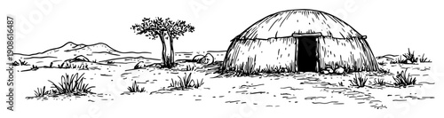 african hut in rural savanna landscape