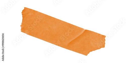Vibrant orange tape strip with torn edges isolated on black Textured adhesive for creative design grunge style