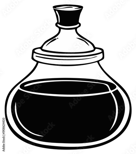 Elegant vintage inkwell bottle with a decorative stopper and dark liquid inside