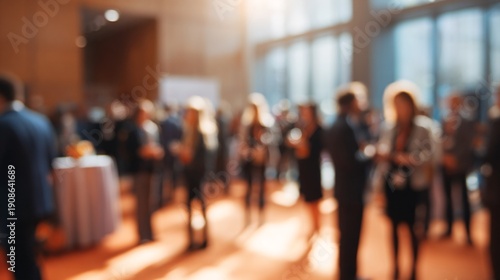 Blurred business networking event with professionals in modern venue