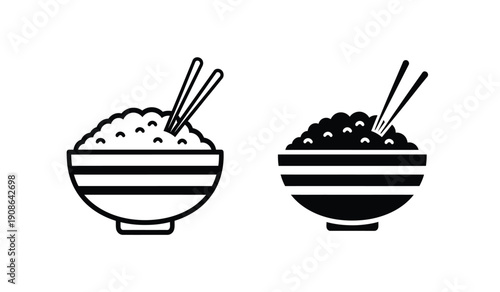 Two bowls of rice and noodles with chopsticks