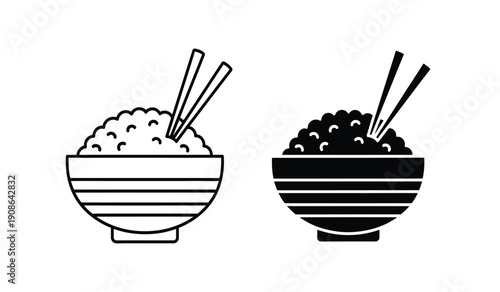 Two bowls of rice and beans with chopsticks
