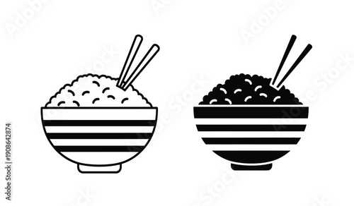 Two bowls of rice and noodles with chopsticks