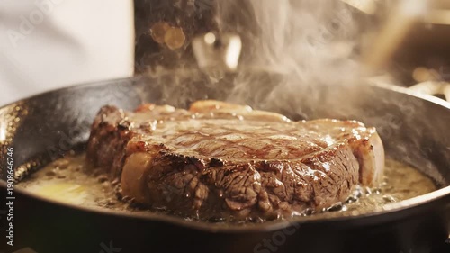 Close-up of a juicy ribeye steak cooking in a hot cast-iron pan, sizzling in butter.