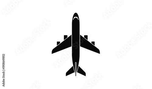 Black silhouette of an airplane flying from above view