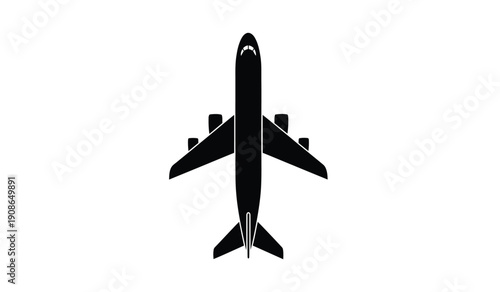 Black silhouette of an airplane flying high with wings and tail visible