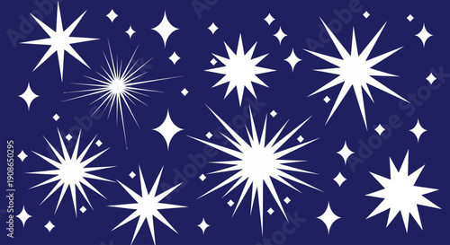 A collection of white starbursts and sparkles against a dark blue background from a directly overhead viewpoint
