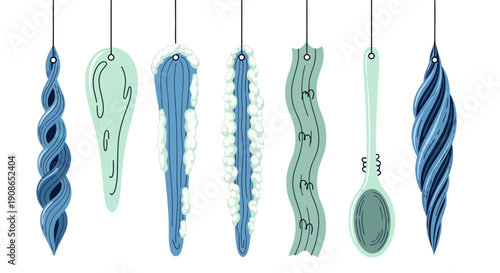 Assorted kitchen utensils hanging from above in a row against a clean backdrop showcasing various designs and shapes