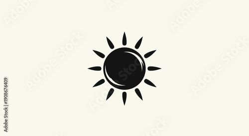 Black sun symbol on cream background
