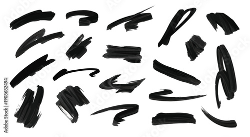 Isolated sets of black and white feathers, nail silhouettes, and paint splashes appear alongside sharp metal office equipment and fashion objects like shoes