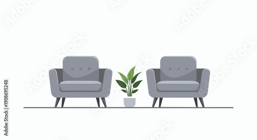 A pair of modern gray lounge chairs with a small green houseplant in a pot placed centrally between them.