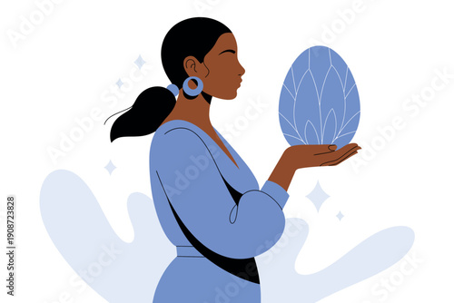 A woman holding a glowing blue crystal in her hand with a peaceful expression