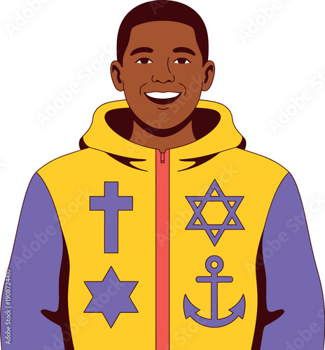 A smiling young man wearing a yellow hoodie with religious symbols