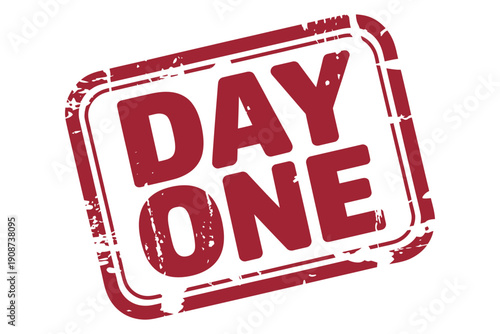 A red stamp with the words Day One on a white background