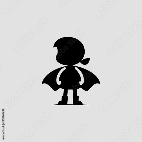 Superhero kid standing strong in bold black silhouette