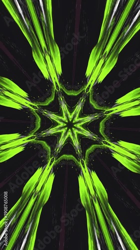 Abstract green kaleidoscope motion background with dynamic geometric star patterns and fluid organic transitions
