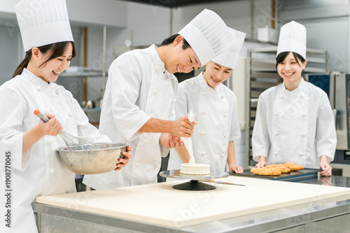 Fotografie Pastry chefs, cake makers, and pastry artisans making cakes and pastries in the