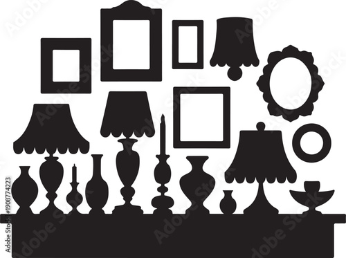 Collection of silhouetted lamps, vases, candle holder and picture frames on shelf