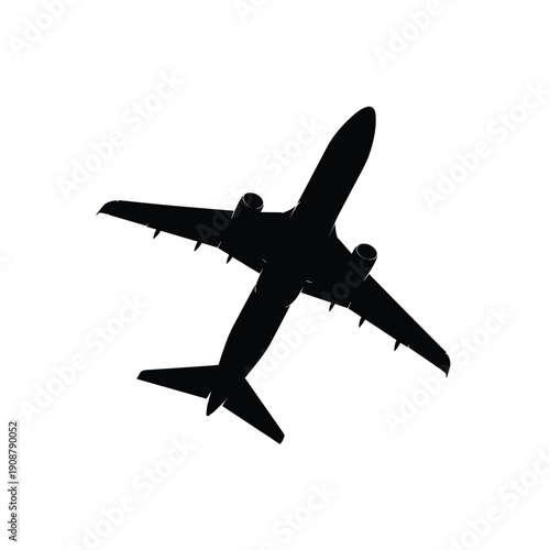 A black silhouette of an airplane flying in the sky