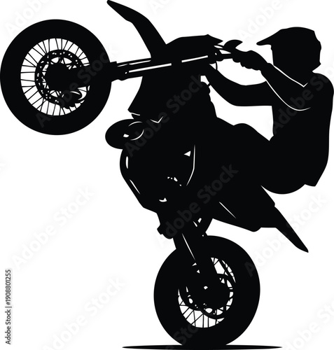 Dynamic Silhouette of a Motorcycle Stunt Rider Performing a Wheelie
