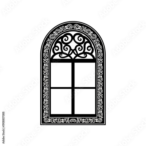 An ornate gothic style arched window with decorative swirls and a grid