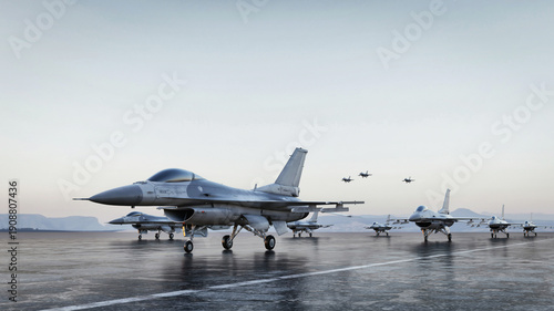 Squadron of military fighter jets on the airfield runway at dawn.