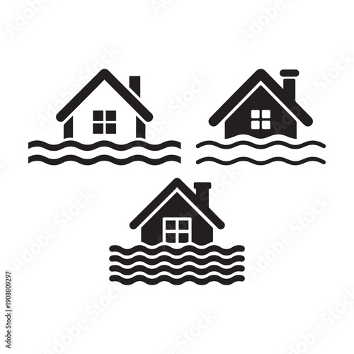 Three black house partially submerged in wavy water home flood inundation