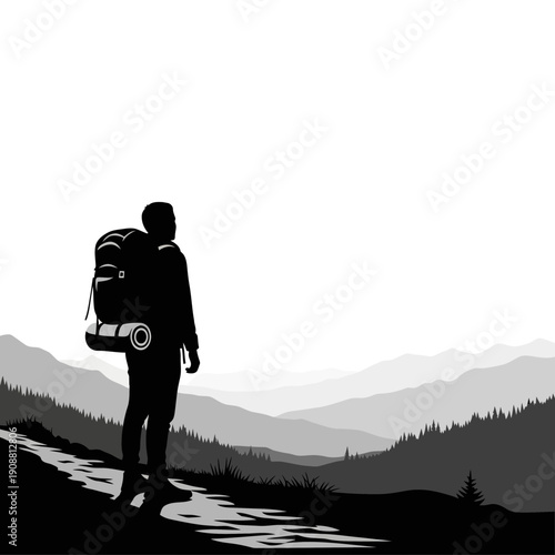 Hiker silhouette on mountain path overlooking misty landscape