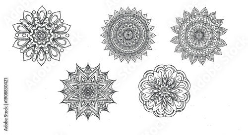 Four intricate mandala designs