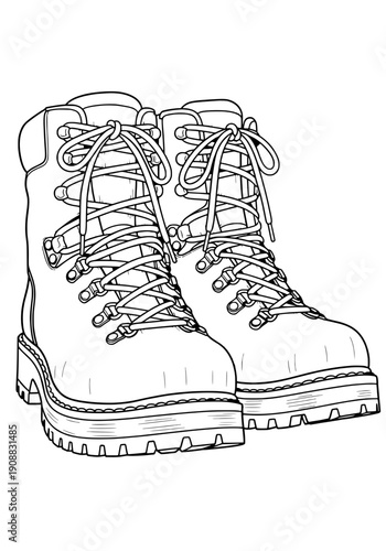 Pair of hiking boots with laces and soles standing ready for adventure outdoors on white